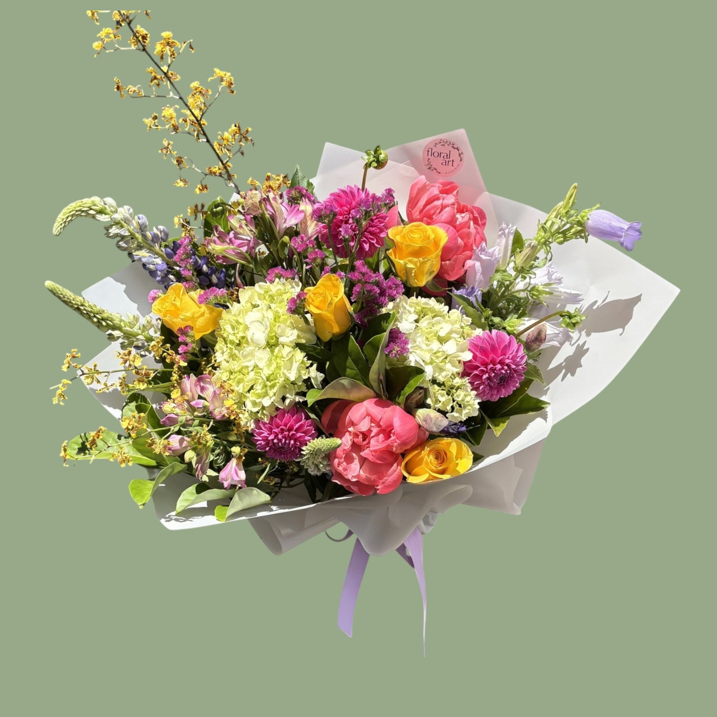 Bouquet of colorful flowers with a green background