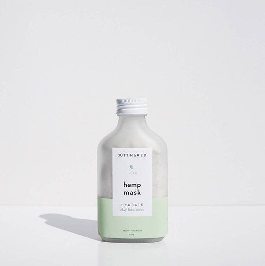 Bottle of Hemp Mask by butt Naked on a white background
