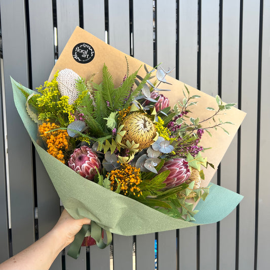 Native and wildflowers arranged in a bouquet