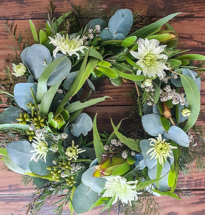 white and green floral wreath