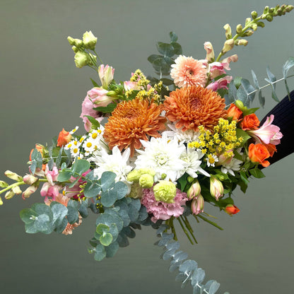 Bouquet of flowers with a green background