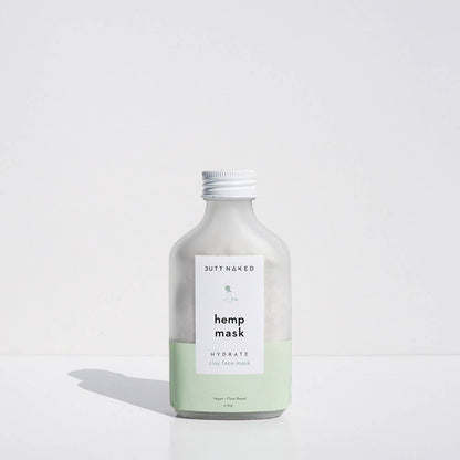 Bottle of Hemp Mask by butt Naked on a white background