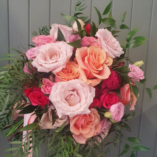 Sunshine Coast Florist offering same day flower delivery to Buderim, Maroochydore and all surrounding suburbs and hospitals. This is an image of colourful roses