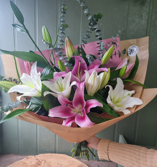 Bouquet with pink and white oriental lilies