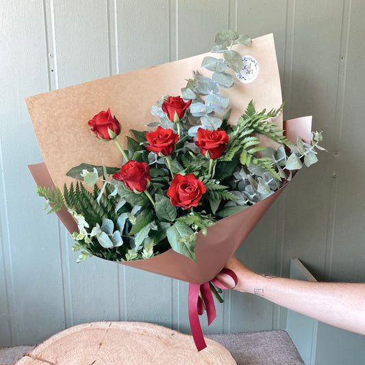 6 long stem roses and foliage bouquet