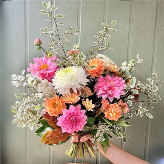 pink orange and yellow flower bouquet